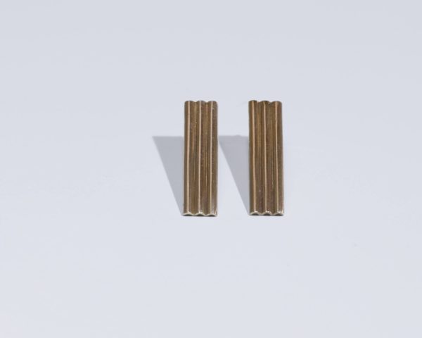 Triade Bronze Face